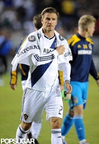 David Beckham wore a towel around his shoulders at his soccer game.
David Beckham wore a towel around his shoulders at his soccer game.
