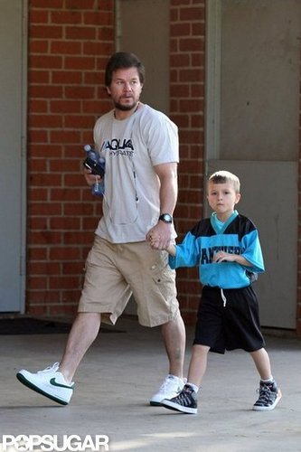 Mark Wahlberg and Michael Wahlberg walked holding hands.
Mark Wahlberg and Michael Wahlberg walked holding hands.