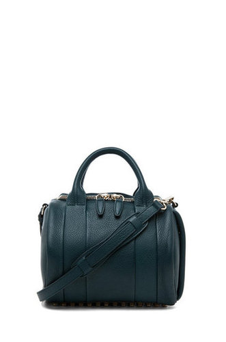 Another year, another beautiful bag to obsess over. This time around, I've got my eye on Alexander Wang's Rockie Satchel ($725). It's a smaller, more compact version of his infamous Rocco duffel, but it definitely doesn't skimp on style. The deep teal shade and brass hardware make it especially drool-worthy.
— Britt Stephens, assistant editor
Another year, another beautiful bag to obsess over. This time around, I've got my eye on Alexander Wang's Rockie Satchel ($725). It's a smaller, more compact version of his infamous Rocco duffel, but it definitely doesn't skimp on style. The deep teal shade and brass hardware make it especially drool-worthy.
— Britt Stephens, assistant editor