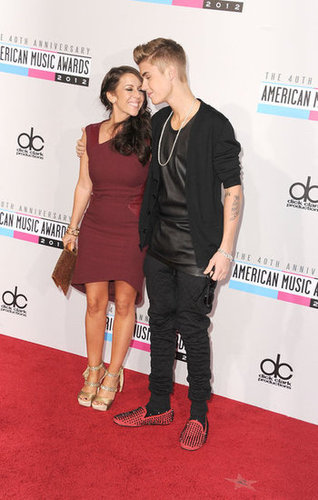 Justin Bieber stood next to his mom.
Justin Bieber stood next to his mom.