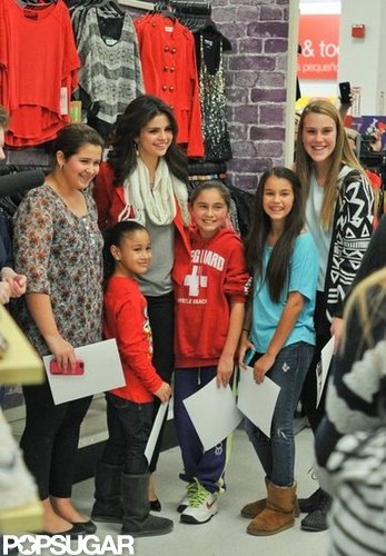 Selena Gomez posed with fans.
Selena Gomez posed with fans.