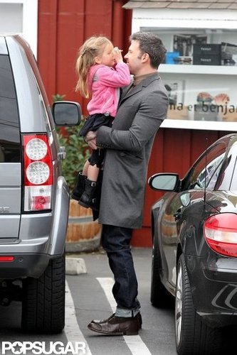Ben Affleck held Seraphina Affleck.
Ben Affleck held Seraphina Affleck.