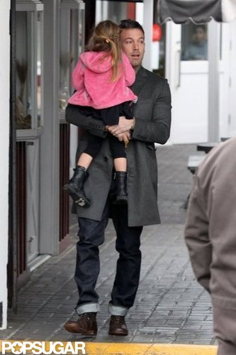 Ben Affleck carried Seraphina Affleck, who wore a pink coat.
Ben Affleck carried Seraphina Affleck, who wore a pink coat.
