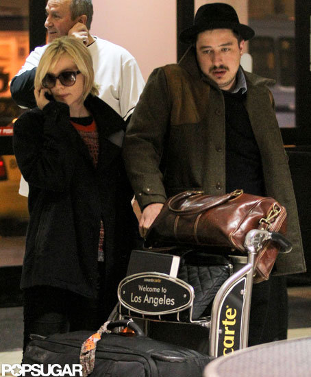 Carey Mulligan and husband Marcus Mumford touched down at LAX.
Carey Mulligan and husband Marcus Mumford touched down at LAX.