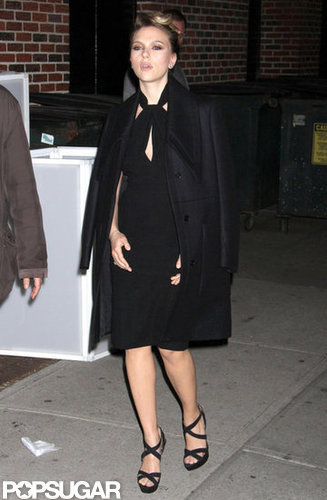 Scarlett Johansson wore a black cape over her dress for a visit to the The Late Show.
Scarlett Johansson wore a black cape over her dress for a visit to the The Late Show.