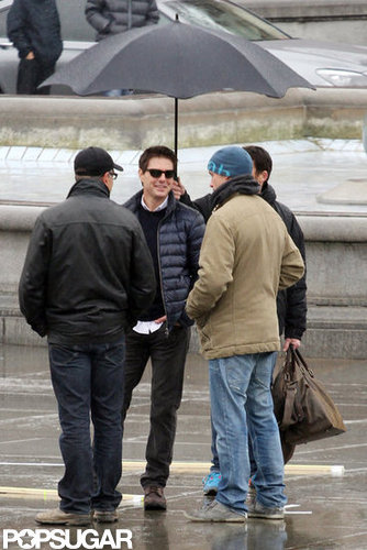 Tom Cruise stood under an umbrella in London.
Tom Cruise stood under an umbrella in London.