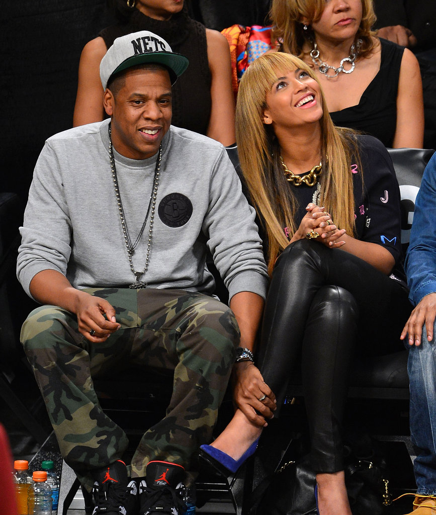 Beyonce Knowles and Jay-Z smiled at the Knicks game in NYC. Beyonce Knowles and Jay-Z smiled at the Knicks game in NYC.
