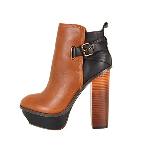 The two-toned color and platform heel literally take Dolce Vita's Jordanna Boot ($203, originally $289) to a whole new level.
The two-toned color and platform heel literally take Dolce Vita's Jordanna Boot ($203, originally $289) to a whole new level.