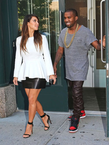 Kanye West and Kim Kardashian went to a movie in NYC in September 2012.
Kanye West and Kim Kardashian went to a movie in NYC in September 2012.