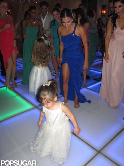 Eva Longoria danced with the flower girls at Mario Lopez and Courtney Mazza's ceremony in Punta Mita, Mexico, in December 2012.
Eva Longoria danced with the flower girls at Mario Lopez and Courtney Mazza's ceremony in Punta Mita, Mexico, in December 2012.
