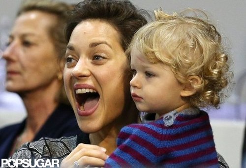 Marion Cotillard held her son, Marcel, at the Masters in Paris.
Marion Cotillard held her son, Marcel, at the Masters in Paris.