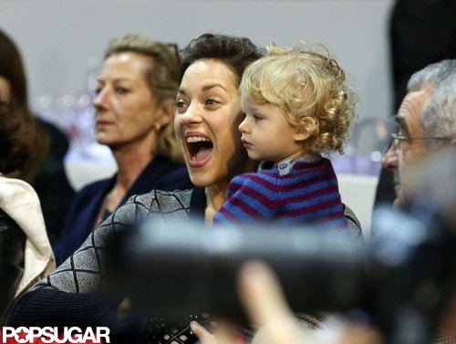 Marion Cotillard got excited while watching the Paris Masters with her son, Marcel.
Marion Cotillard got excited while watching the Paris Masters with her son, Marcel.