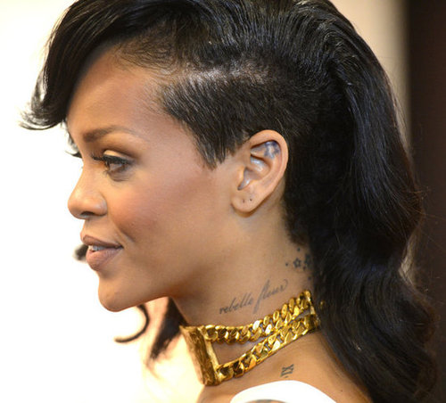 We love Rihanna's half ladylike, half cool-girl shaved hairdo — check out those tattoos!
We love Rihanna's half ladylike, half cool-girl shaved hairdo — check out those tattoos!