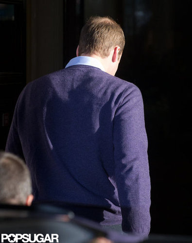 Prince William wore a purple sweater.
Prince William wore a purple sweater.