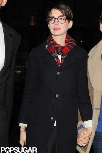 Anne Hathaway held her husband's hand.
Anne Hathaway held her husband's hand.