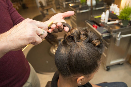 Finally, you want to sweep the sides and back upward. Make sure to secure the hair with a bobby pin first, then create the barrel curl and secure again.
Finally, you want to sweep the sides and back upward. Make sure to secure the hair with a bobby pin first, then create the barrel curl and secure again.