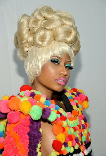 Her piled-high hair was, surprisingly, the least outlandish part of Nicki's look at Carolina Herrera's runway show in September 2011.
Her piled-high hair was, surprisingly, the least outlandish part of Nicki's look at Carolina Herrera's runway show in September 2011.