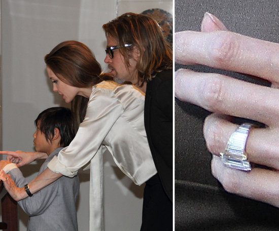 Angelina Jolie's custom-designed Robert Procop engagement ring was a gift from Brad Pitt in April. The enormous middle diamond is set in a diamond-covered art deco band, with Brad helping Robert achieve the final design.
Angelina Jolie's custom-designed Robert Procop engagement ring was a gift from Brad Pitt in April. The enormous middle diamond is set in a diamond-covered art deco band, with Brad helping Robert achieve the final design.