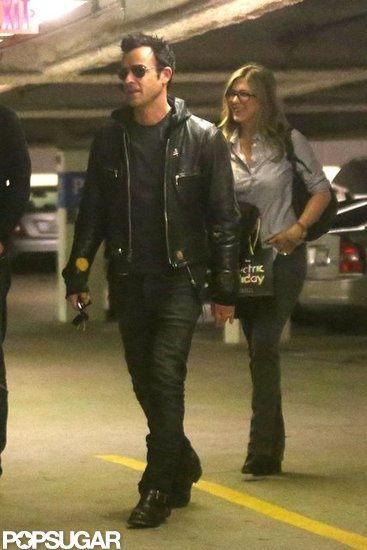 Jennifer Aniston and Justin Theroux left Barneys. Jennifer Aniston and Justin Theroux left Barneys.