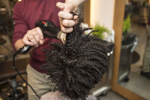 The next step to getting the big hair of your natural dreams is to stretch it with a blow dryer. Focus the heat at your roots while pulling hair from the midshaft. In order to prevent frizz, however, try to avoid combing hair with your fingers.
The next step to getting the big hair of your natural dreams is to stretch it with a blow dryer. Focus the heat at your roots while pulling hair from the midshaft. In order to prevent frizz, however, try to avoid combing hair with your fingers.