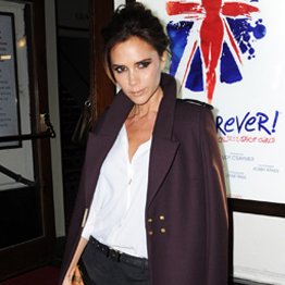Victoria Beckham Wearing Long Purple Coat