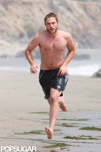 Robert Pattinson spent a shirtless day on the beach in Malibu this March.
Robert Pattinson spent a shirtless day on the beach in Malibu this March.