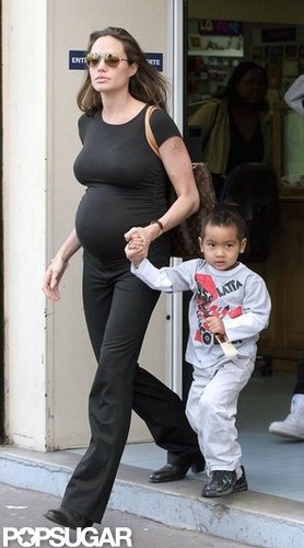 A pregnant Angelina Jolie took Maddox by the hand during a March 2006 stay in Paris.
A pregnant Angelina Jolie took Maddox by the hand during a March 2006 stay in Paris.