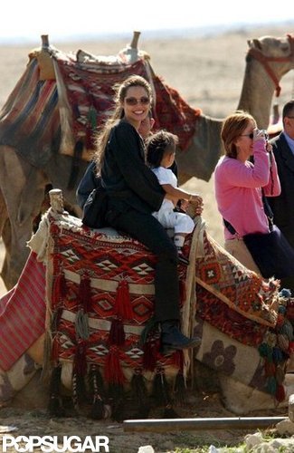 Angelina Jolie traveled in Egypt in December 2003 with Maddox.
Angelina Jolie traveled in Egypt in December 2003 with Maddox.
