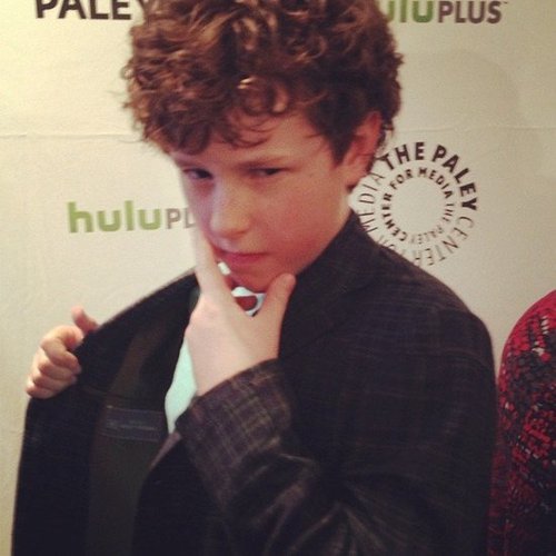 Modern Family's Nolan Gould happily posed for a photo during PaleyFest upon our request.
Modern Family's Nolan Gould happily posed for a photo during PaleyFest upon our request.