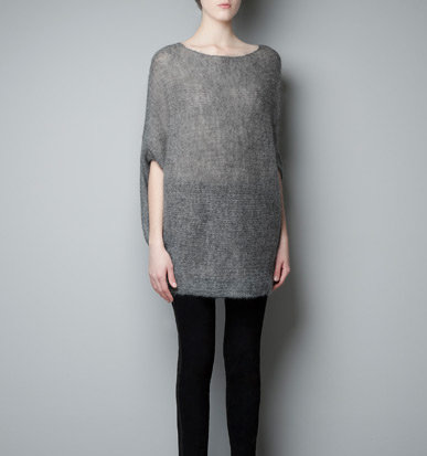 We love the idea of layering a slim black turtleneck under Zara's poncho sweater ($60) for extra warmth during the Winter.
We love the idea of layering a slim black turtleneck under Zara's poncho sweater ($60) for extra warmth during the Winter.