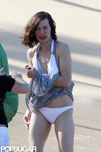 Bikini-Clad Milla Jovovich Poses Beachside With Her Family on NYE Bikini-Clad Milla Jovovich Poses Beachside With Her Family on NYE
