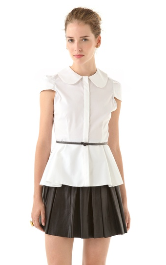 This Alice + Olivia peplum top ($198) reminds us of our school days. It will lend instant femininity to any bottom, and we adore the Peter Pan collar and the metal belt.
This Alice + Olivia peplum top ($198) reminds us of our school days. It will lend instant femininity to any bottom, and we adore the Peter Pan collar and the metal belt.
