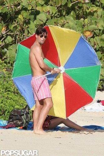 Johannes Huebl fixed the umbrella.
Johannes Huebl fixed the umbrella.