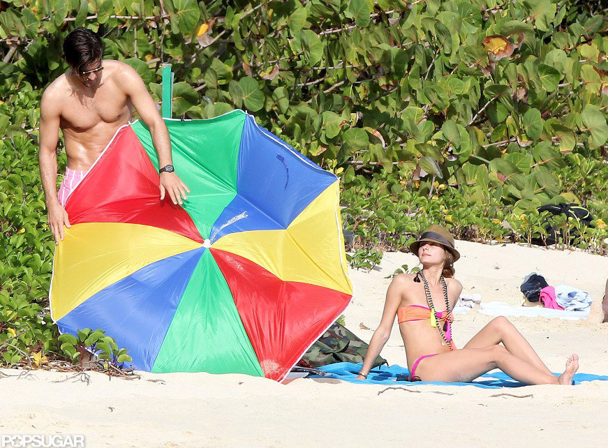 Olivia Palermo's boyfriend, Johanne Huebl, tried to fix their broken beach umbrella while they vacationed together in St. Barts in January.
Olivia Palermo's boyfriend, Johanne Huebl, tried to fix their broken beach umbrella while they vacationed together in St. Barts in January.