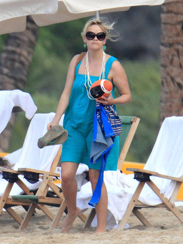 Reese Witherspoon made a sweet, electric blue sundress into the perfect beach look with a few well-placed jewels and oversize shades.
Reese Witherspoon made a sweet, electric blue sundress into the perfect beach look with a few well-placed jewels and oversize shades.