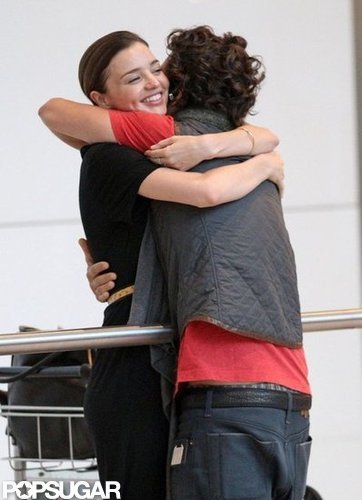 Orlando Bloom hugged Miranda Kerr upon arriving at London's Heathrow Airport in July 2010.
Orlando Bloom hugged Miranda Kerr upon arriving at London's Heathrow Airport in July 2010.