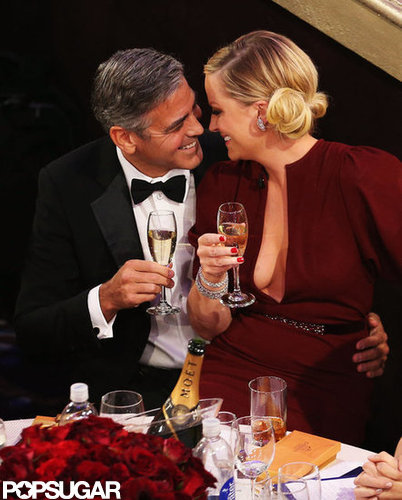 Host Amy Poehler and George Clooney shared a moment during the Golden Globes.
Host Amy Poehler and George Clooney shared a moment during the Golden Globes.