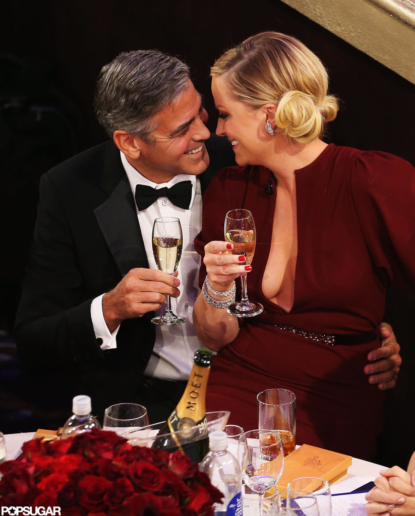 Host Amy Poehler and George Clooney shared a moment during the Golden Globes.
Host Amy Poehler and George Clooney shared a moment during the Golden Globes.
