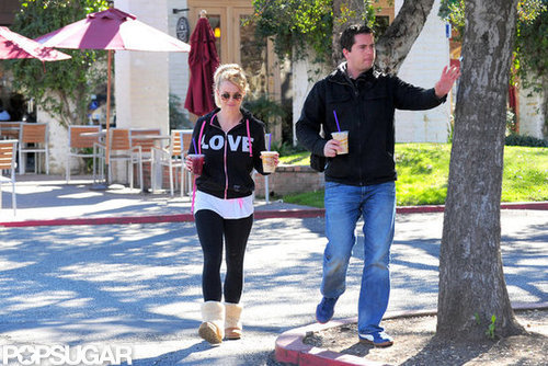 Britney Spears walked with a bodyguard.
Britney Spears walked with a bodyguard.