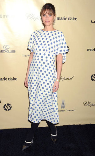 Amanda Peet opted for a printed blue and white shift dress, complete with black tights and pointy-toe pumps, at the Weinstein party.
Amanda Peet opted for a printed blue and white shift dress, complete with black tights and pointy-toe pumps, at the Weinstein party.