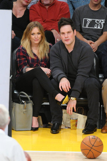 Hilary Duff kept cozy in a plaid flannel top and black skinny denim, then added black pointed pumps and a gray Céline luggage tote for a polished finish.
Hilary Duff kept cozy in a plaid flannel top and black skinny denim, then added black pointed pumps and a gray Céline luggage tote for a polished finish.