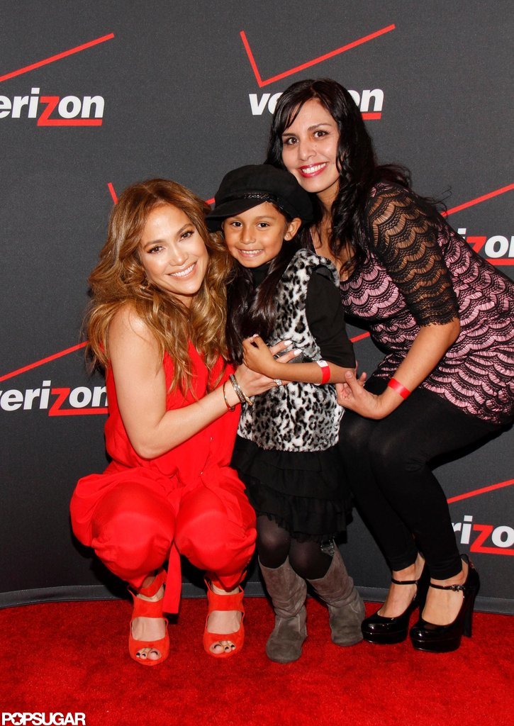 Jennifer Lopez posed for a picture with a young fan.
Jennifer Lopez posed for a picture with a young fan.