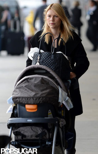 Claire Danes pushed baby Cyrus Dancy in his stroller at LAX.
Claire Danes pushed baby Cyrus Dancy in his stroller at LAX.