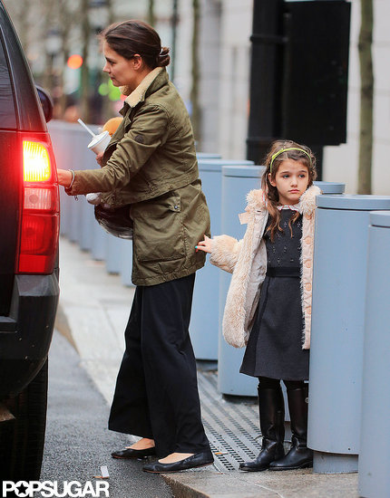 Katie Holmes and Suri Cruise got in an SUV. Katie Holmes and Suri Cruise got in an SUV.