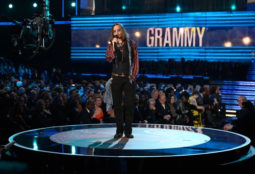 Johnny Depp took the stage to introduce performers Mumford & Sons at the 2013 Grammy Awards.
Johnny Depp took the stage to introduce performers Mumford & Sons at the 2013 Grammy Awards.