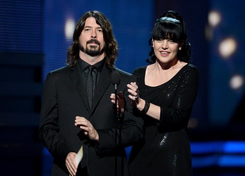 Dave Grohl presented with Pauley Perrette.
Dave Grohl presented with Pauley Perrette.
