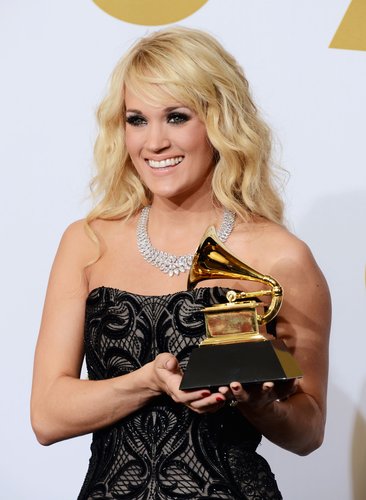 Carrie Underwood posed with her Grammy backstage in 2013.
Carrie Underwood posed with her Grammy backstage in 2013.