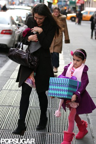 Katie Holmes and Suri Go Out Bearing Gifts in NYC Katie Holmes and Suri Go Out Bearing Gifts in NYC