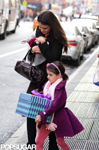 Katie Holmes and Suri Go Out Bearing Gifts in NYC Katie Holmes and Suri Go Out Bearing Gifts in NYC