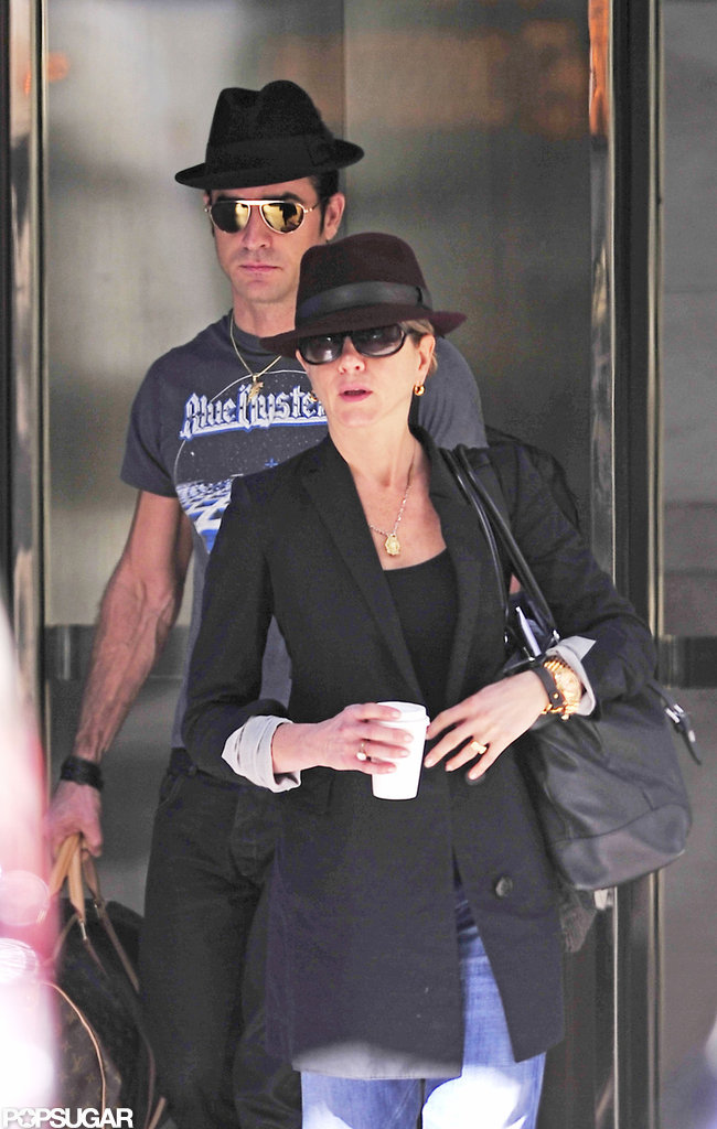 The couple left their NYC building in October 2011 wearing matching hats.
The couple left their NYC building in October 2011 wearing matching hats.